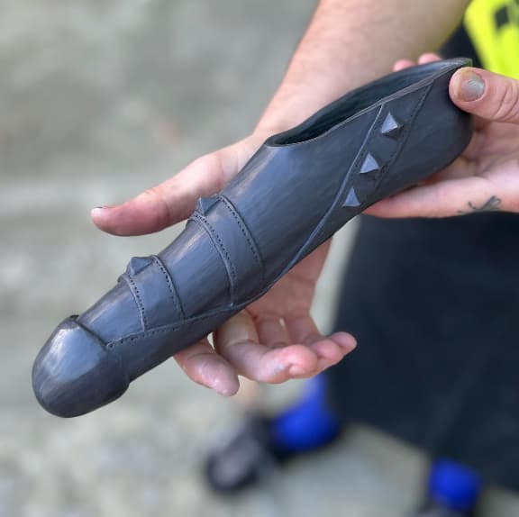 1. This is a stand to pee tool made by the artist, Fleshpiece ie. Ruby Kale. Made out of porcelain and decorated with clay pyramid studs and straps it has a BDSM vibe.