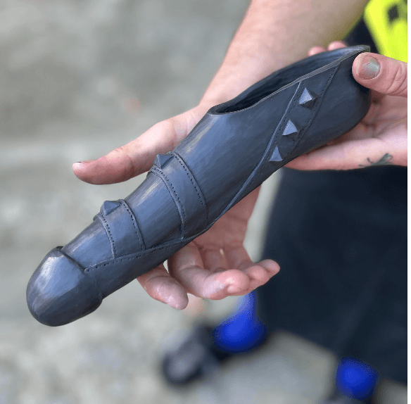 1. This is a stand to pee tool made by the artist, Fleshpiece ie. Ruby Kale. Made out of porcelain and decorated with clay pyramid studs and straps it has a BDSM vibe.