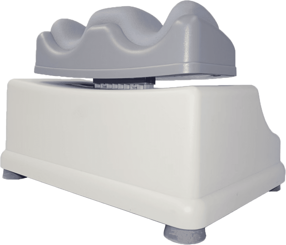 2. A chi machine sits, we view it from behind - and can see the spots where two ankles would rest as to rounded divets. The whole machine is rounded and plastic.